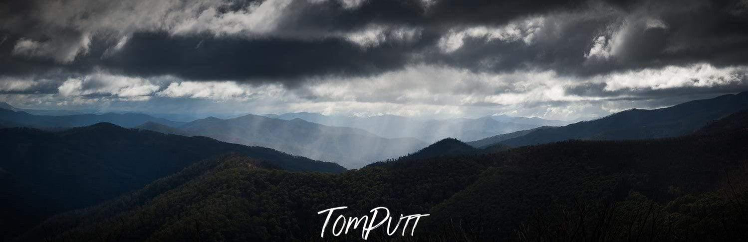 Dark mountain walls with heavy stormy clouds over them, Rain - Victorian High Country