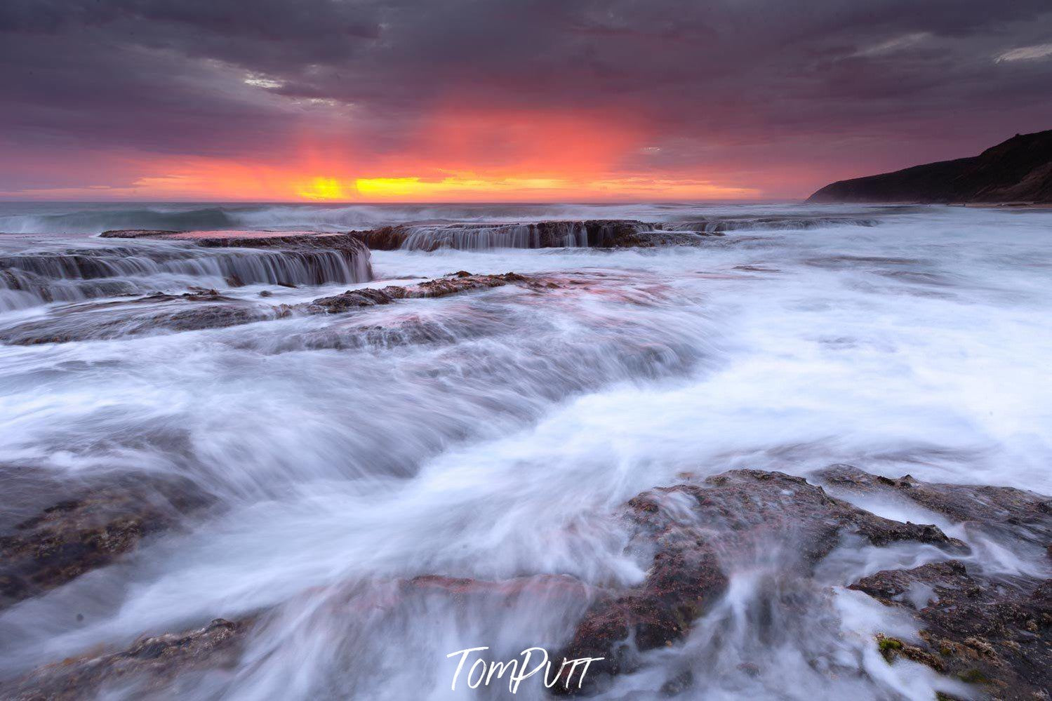 Heavy steady water flow on a rocky land, Rainstorm - Great Ocean Road VIC