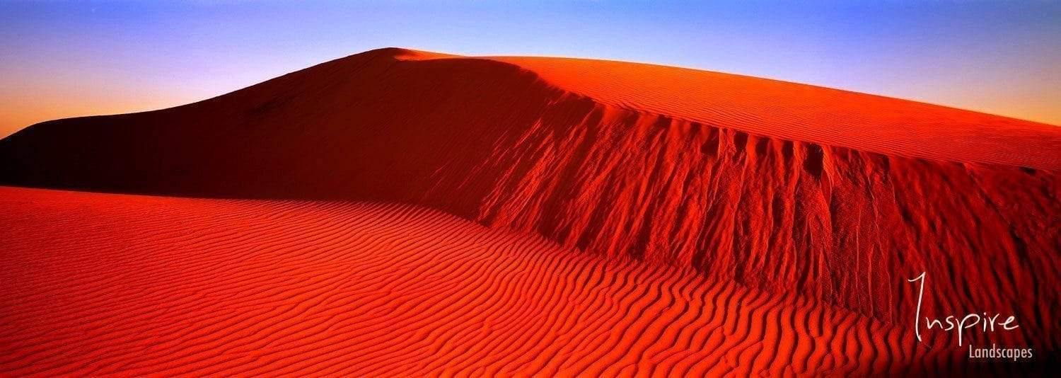 Natural lines of sand over a dark orangish desert, Red Dune - Outback Australia
