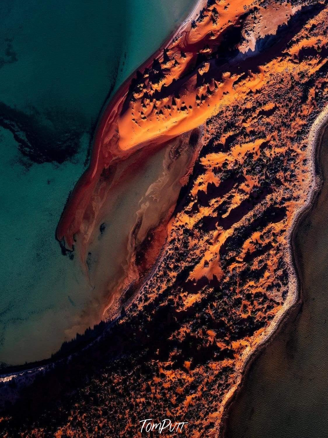 Aerial view of long stony land with a sea connecting, Red Eagle 