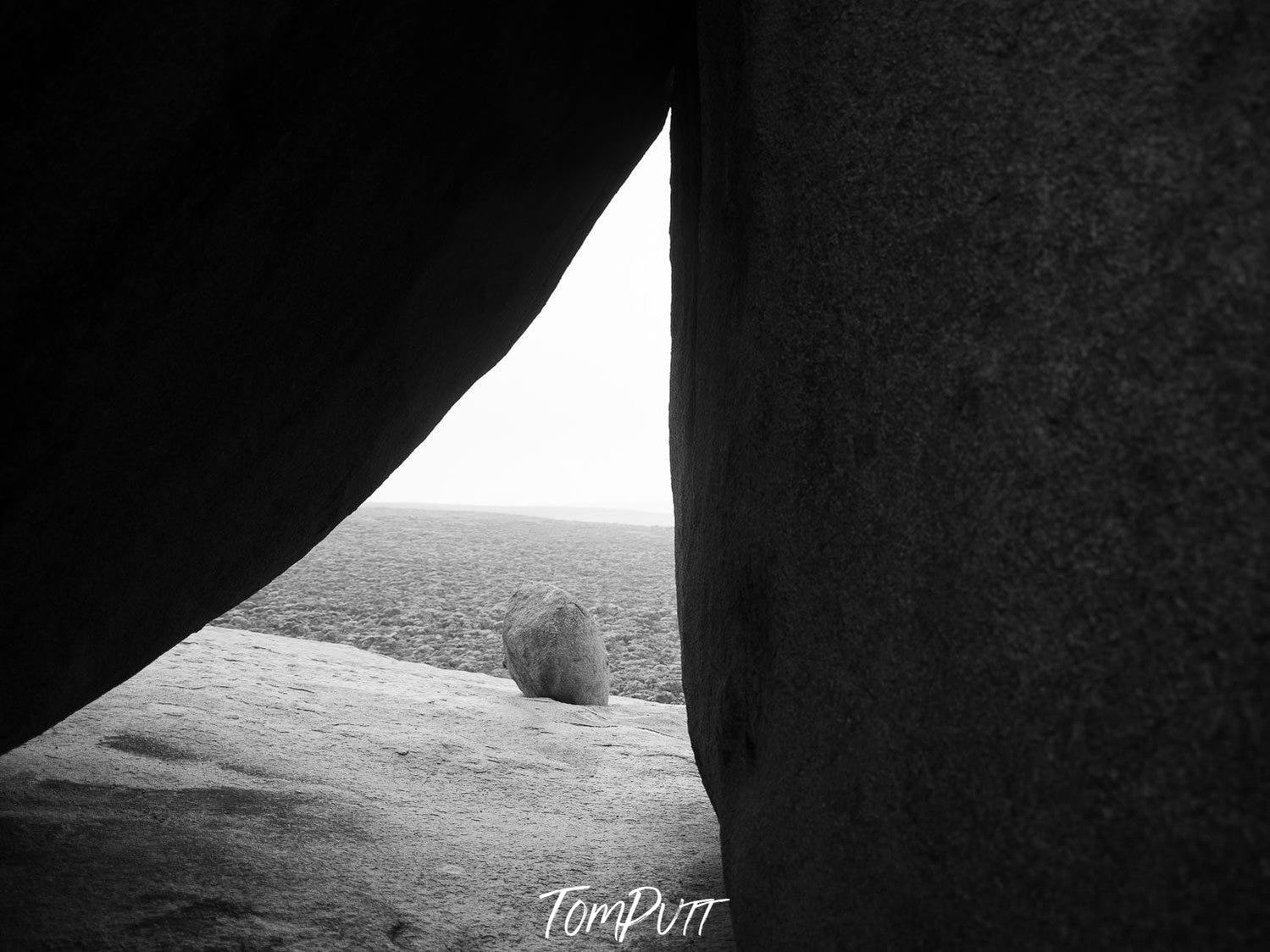 Black and white view of a windowing shape between two large boulders, Remarkable Rocks #15 - Kangaroo Island SA