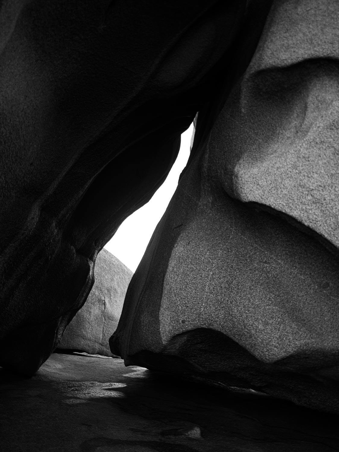 Dark view of connecting giant mountain walls, with a little gap in between, Remarkable Rocks #9 - Kangaroo Island SA