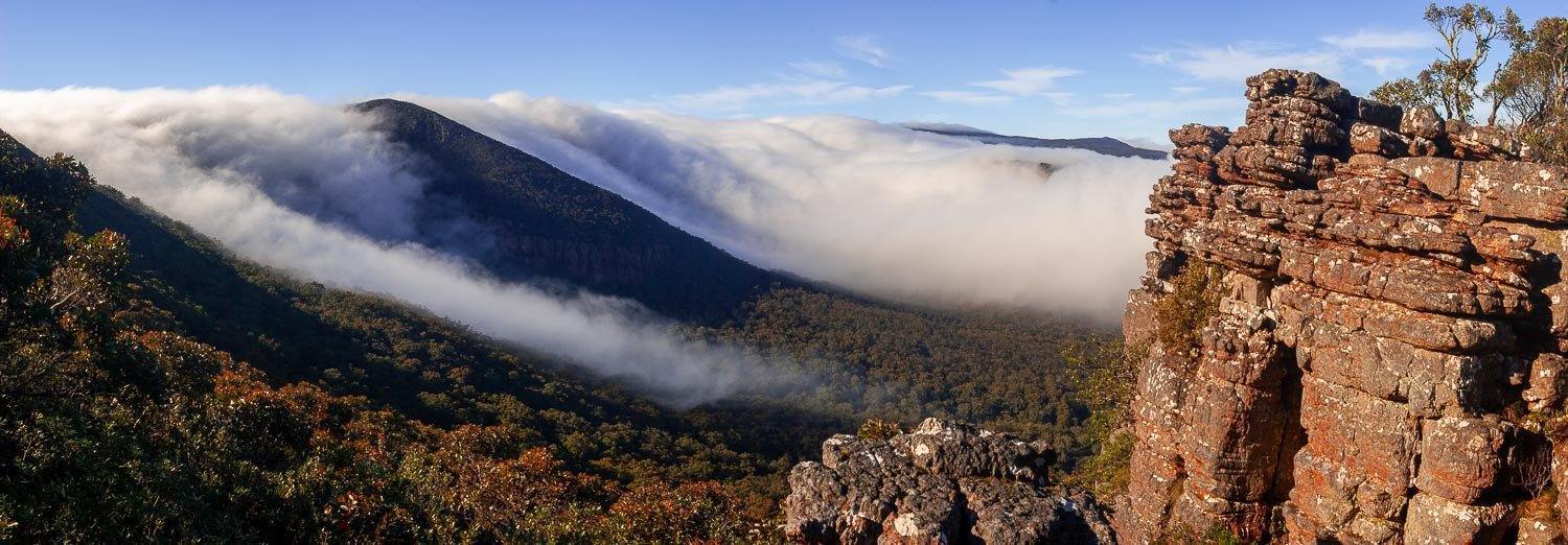 A high mountain wall covered with thick clouds, Rolling Dawn - The Grampians, VIC