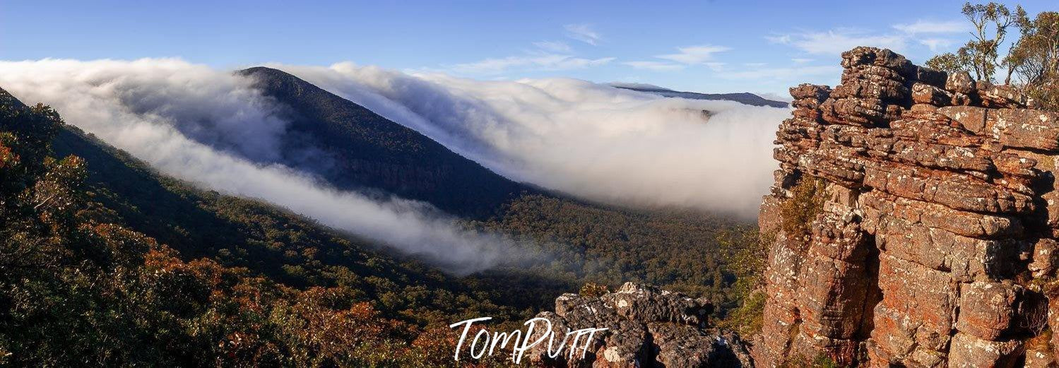 A high mountain wall covered with thick clouds, Rolling Dawn - The Grampians, VIC