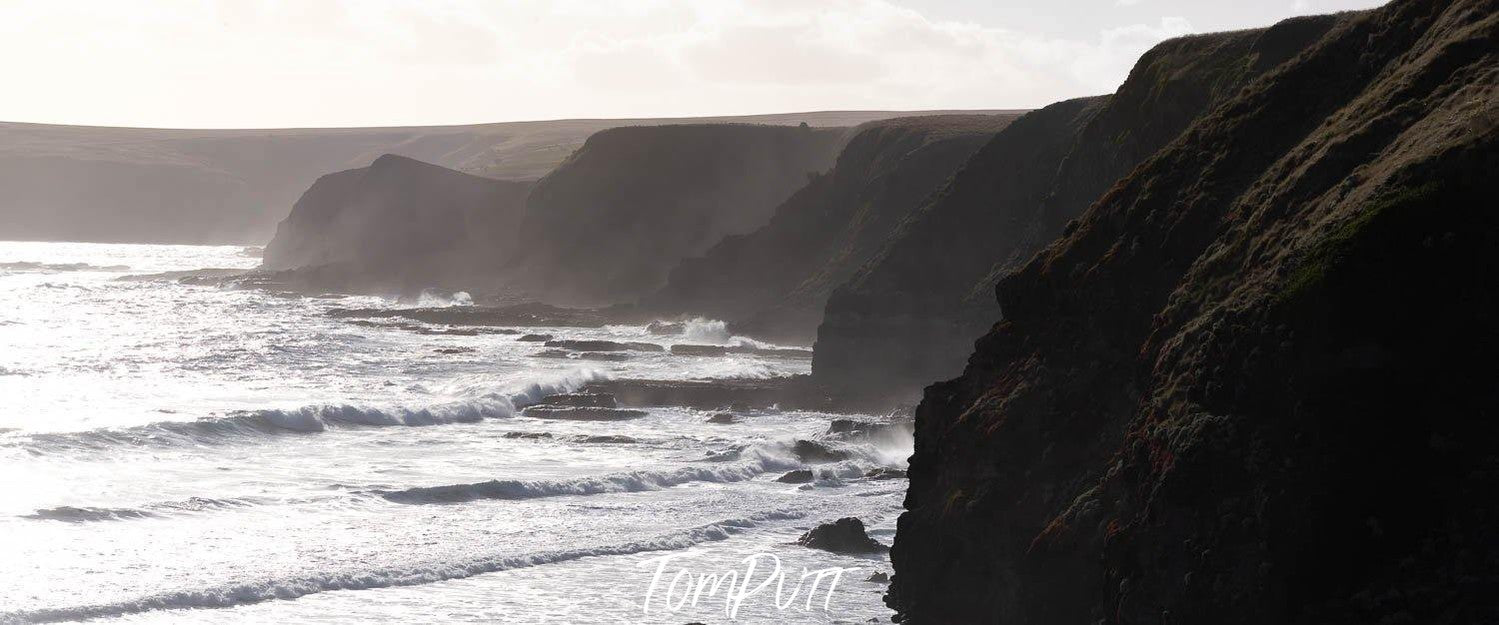 Giant black mountain sequence on the edge of a seashore, Rugged Coastline Flinders - Mornington Peninsula VIC