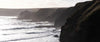 Giant black mountain sequence on the edge of a seashore, Rugged Coastline Flinders - Mornington Peninsula VIC