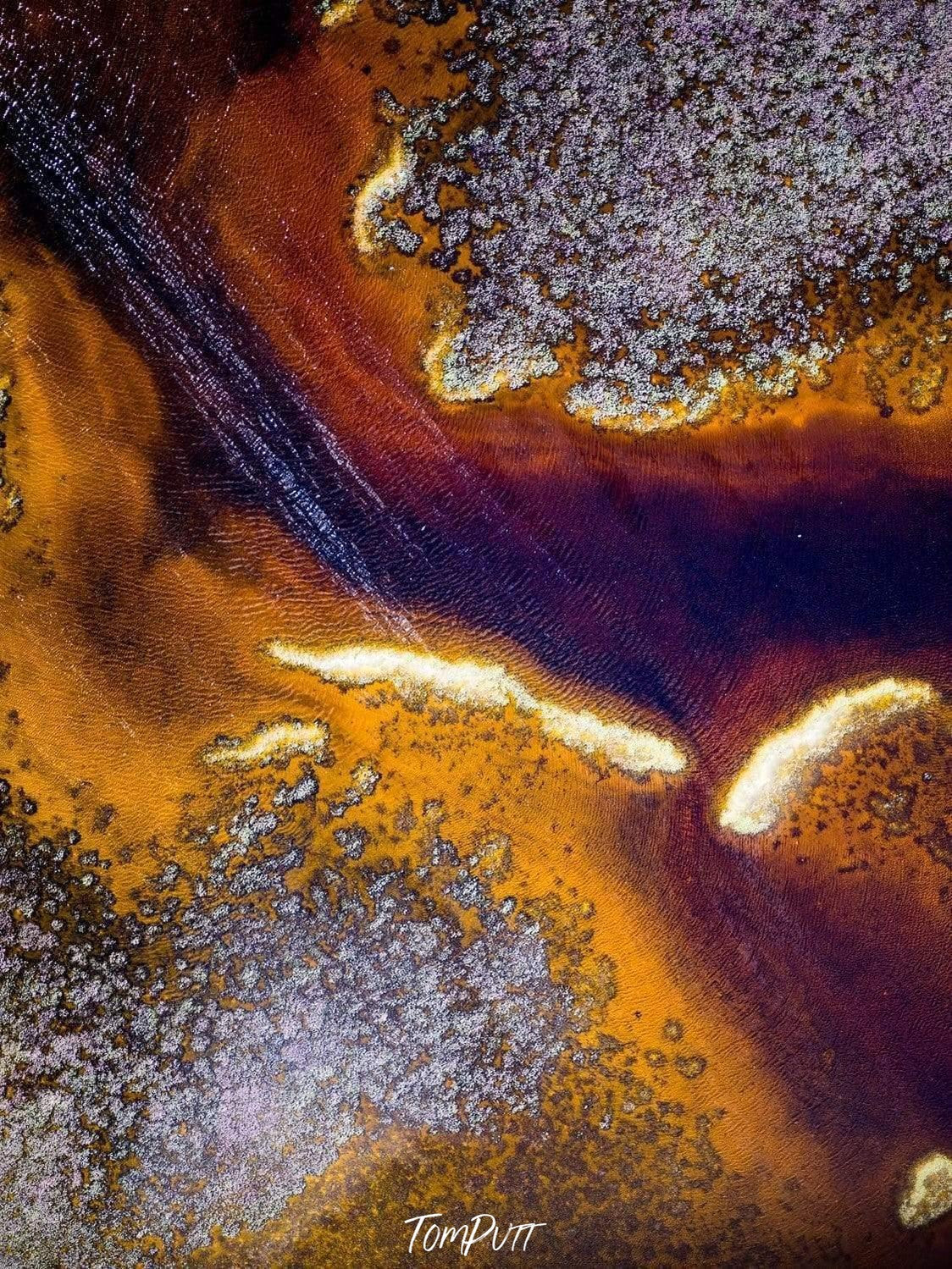 Aerial view of an orangish land with some white color texture over, Rustic Waters Artwork Print