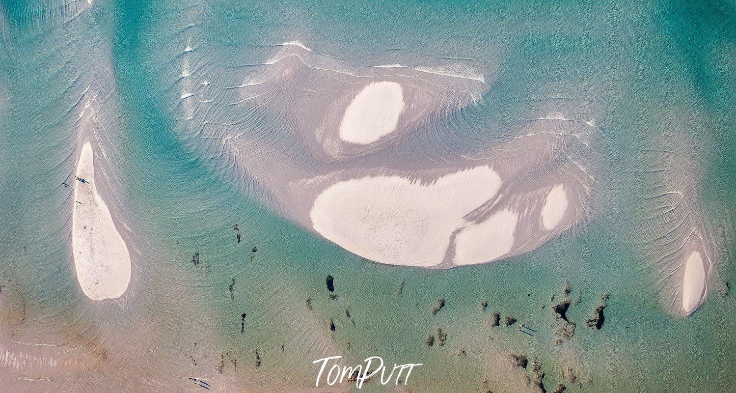 Aerial view of a sea with large rocks underwater, Sand Banks - Mornington Peninsula VIC