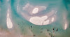 Aerial view of a sea with large rocks underwater, Sand Banks - Mornington Peninsula VIC