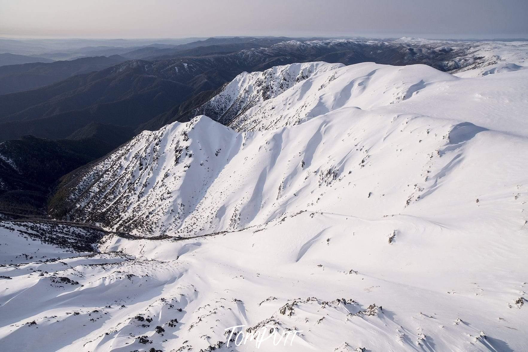 Giant snow-covered mountain lines, Sentinel Snow - Snowy Mountains NSW