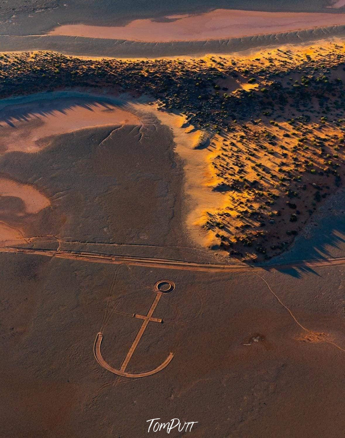 Aerial view of the green stony mound and a big anchor rope symbol on the ground, Ships Ahoy