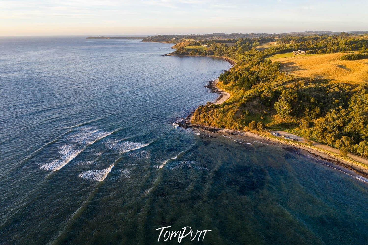 Aerial view of a sea corner with a giant green mountain line, Shoreham - Mornington Peninsula VIC