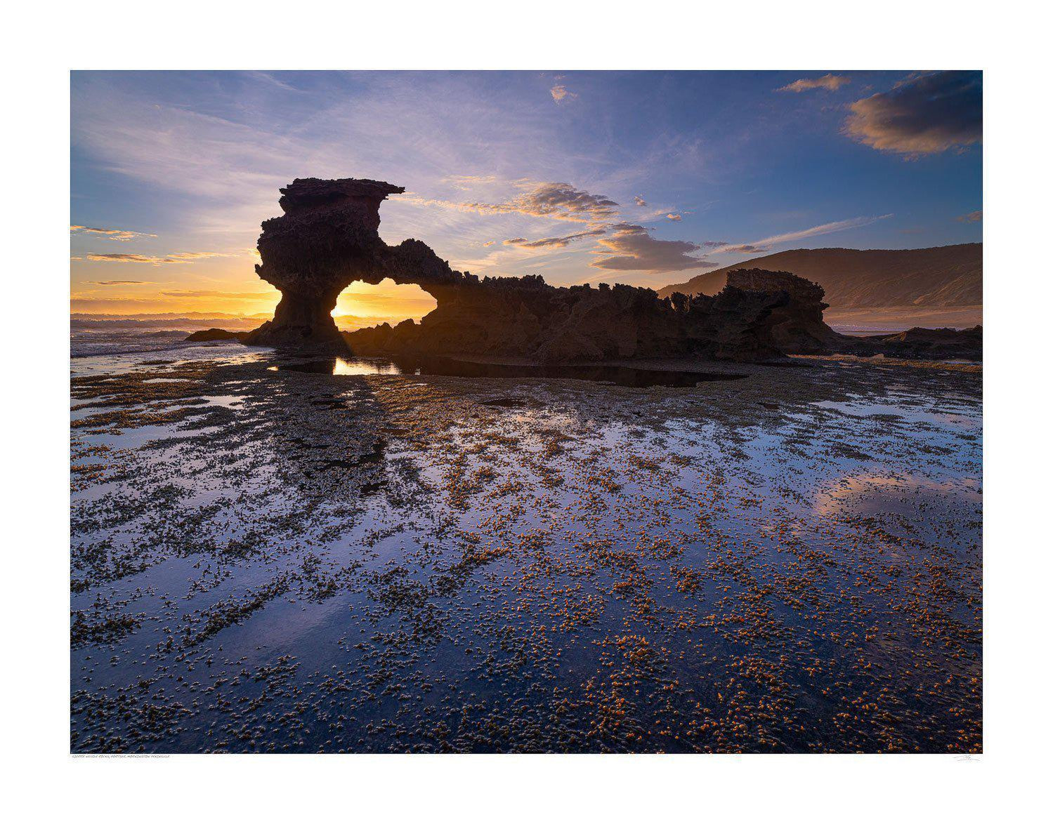 The unique shape formed by a big rocky mountain wall in the evening, Sierra Nevada Rocks - Mornington Peninsula VIC