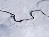 A long curvy line over the snow-covered land, Snow Ribbon - Snowy Mountains NSW