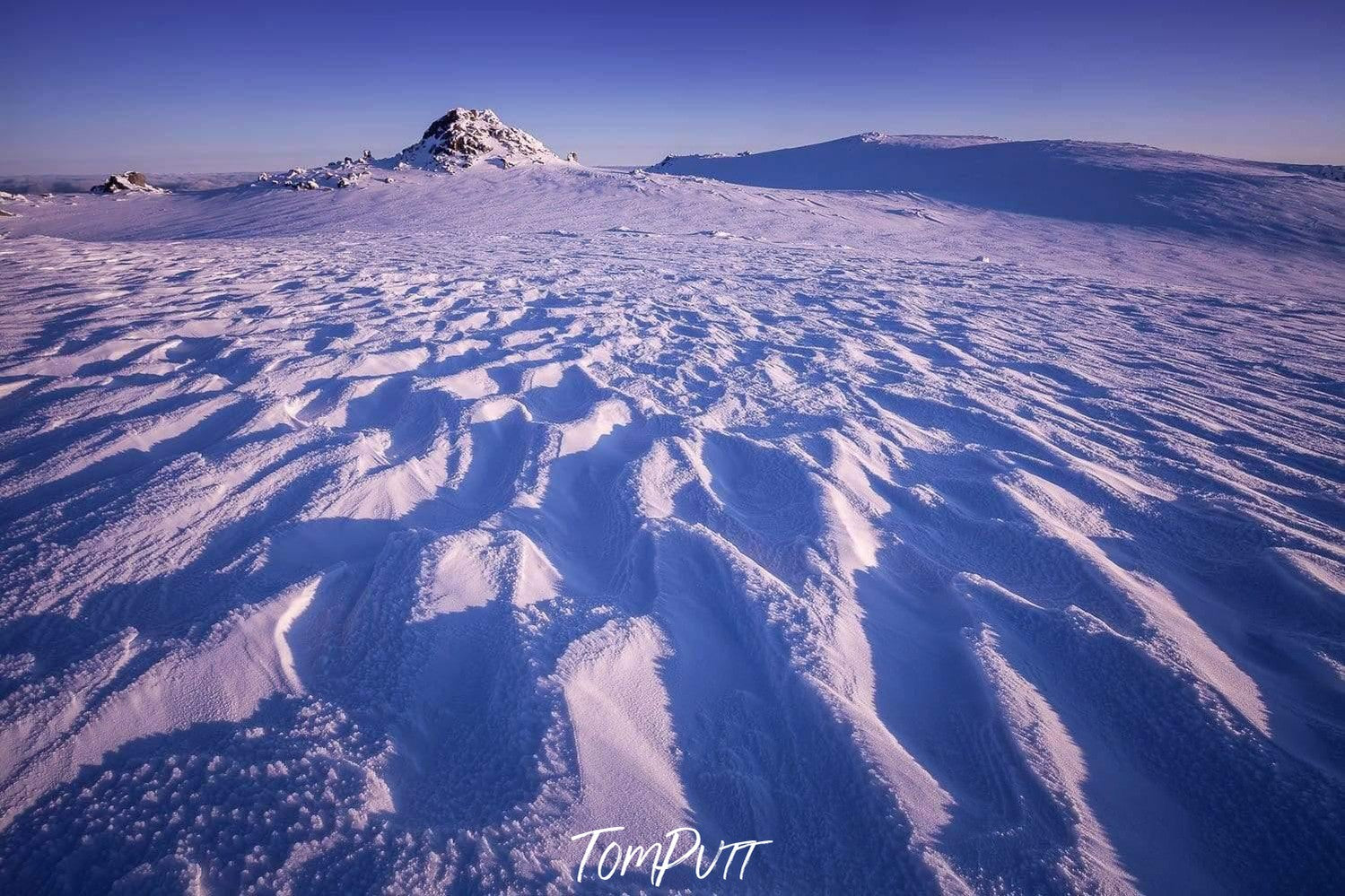 A long snowy land with some patterns of small waves, Snow Ridges - Snowy Mountains NSW