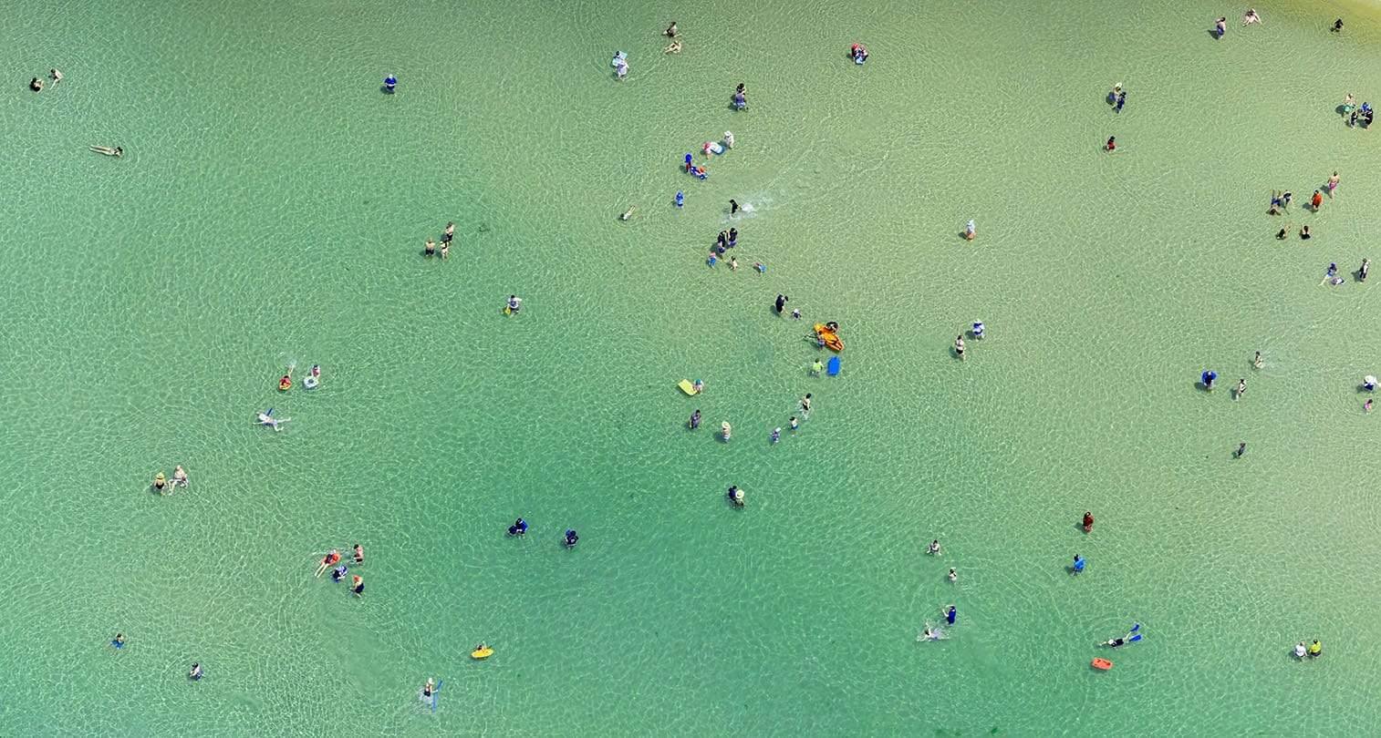 Aerial view of a busy beach with people maintaining social distance, Social Distancing - Mornington Peninsula VIC
