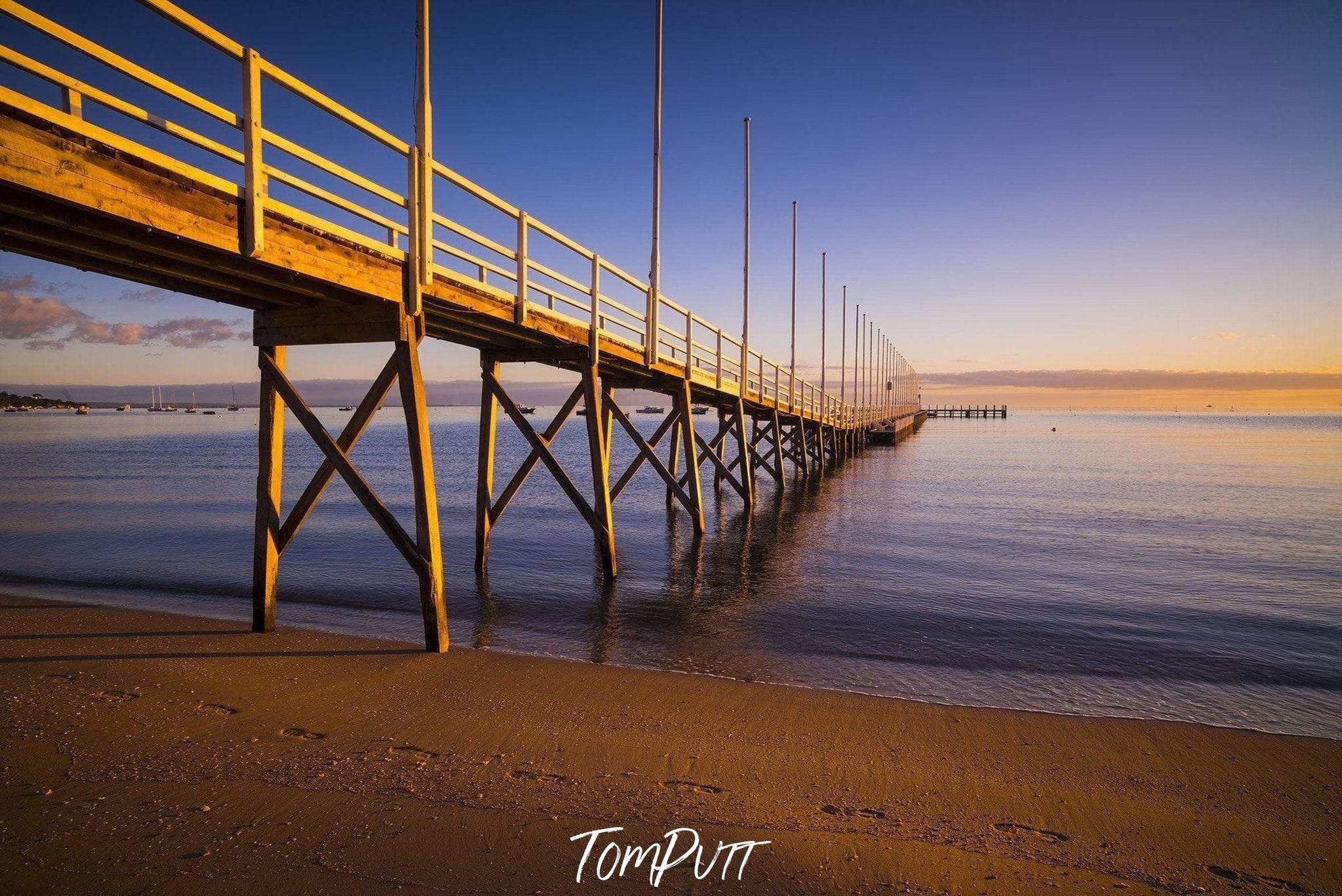 A long bridge over the lake with the pillar underwater, Sorrento Couta Boat Club Jetty sunrise