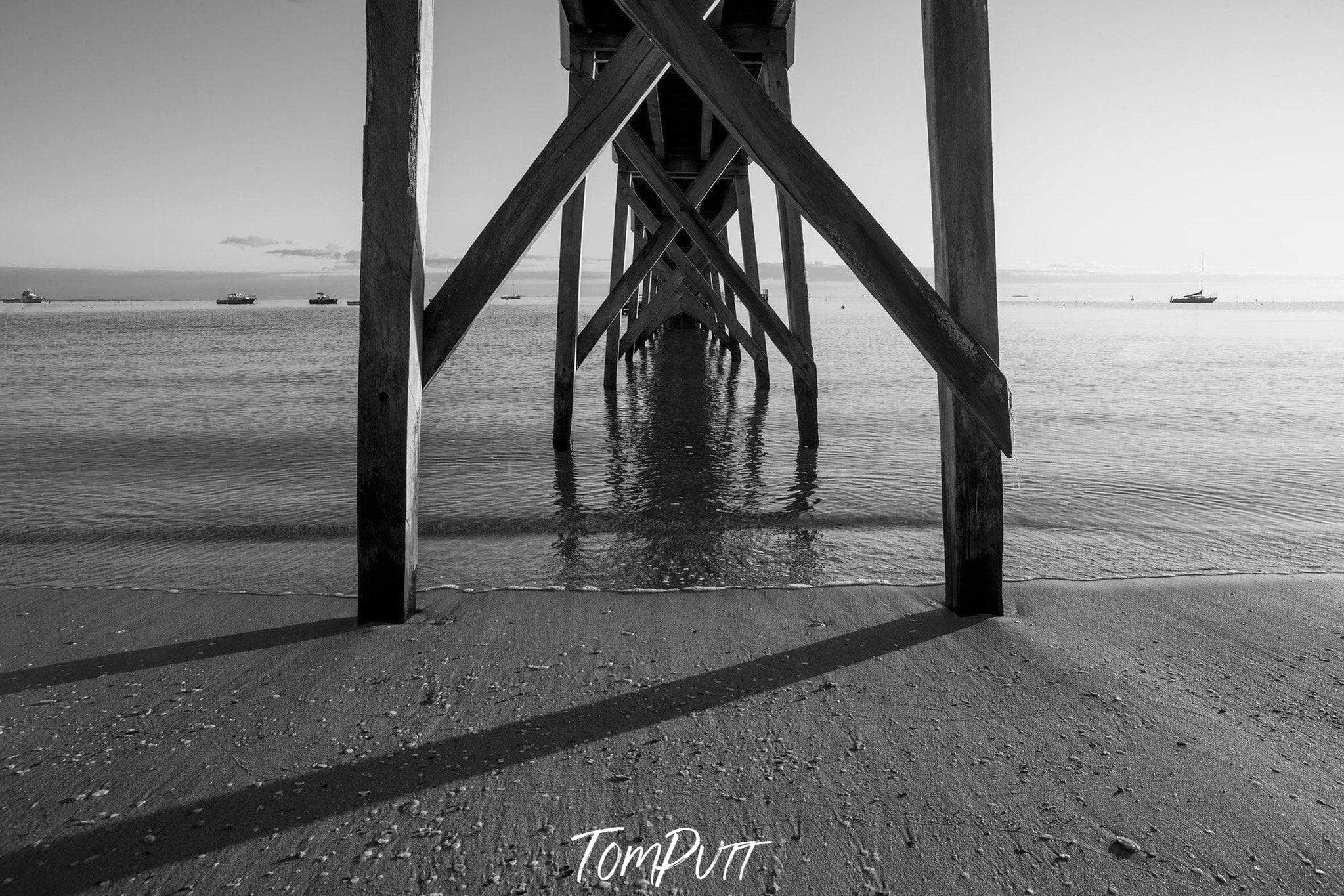 From the down capture of a wooden bridge on the beach, Sorrento Couta Boat Club pier, underneath