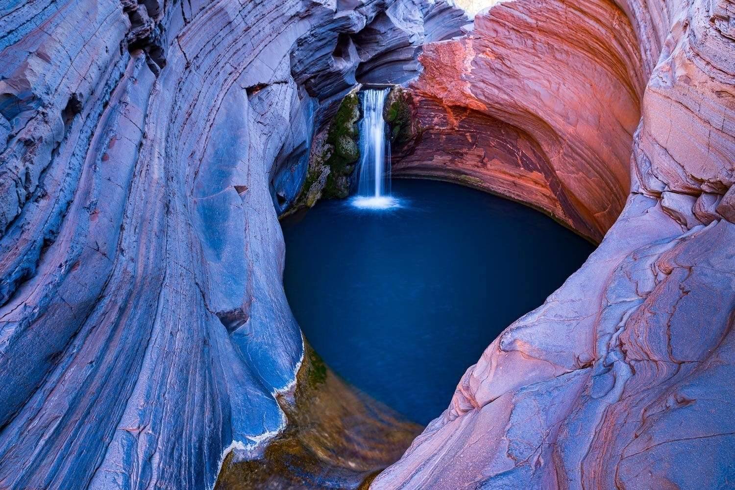 A deep natural pool below the high mountain walls, Spa Pool - Karijini, The Pilbara