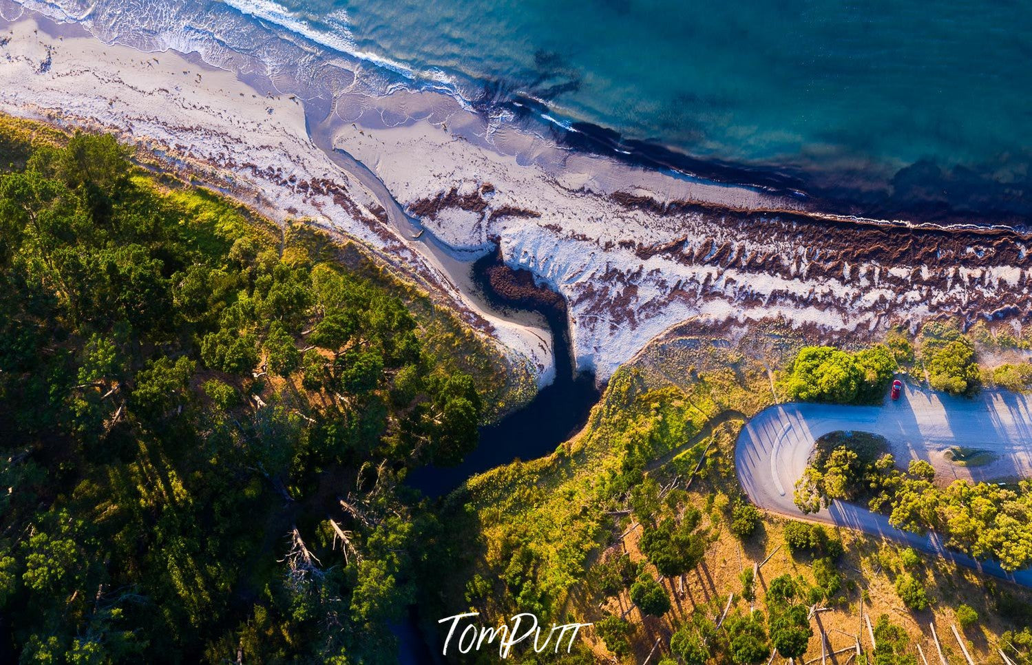 Aerial view of a thick green hill area beside the deep-sea, Stony Creek from above - Mornington Peninsula