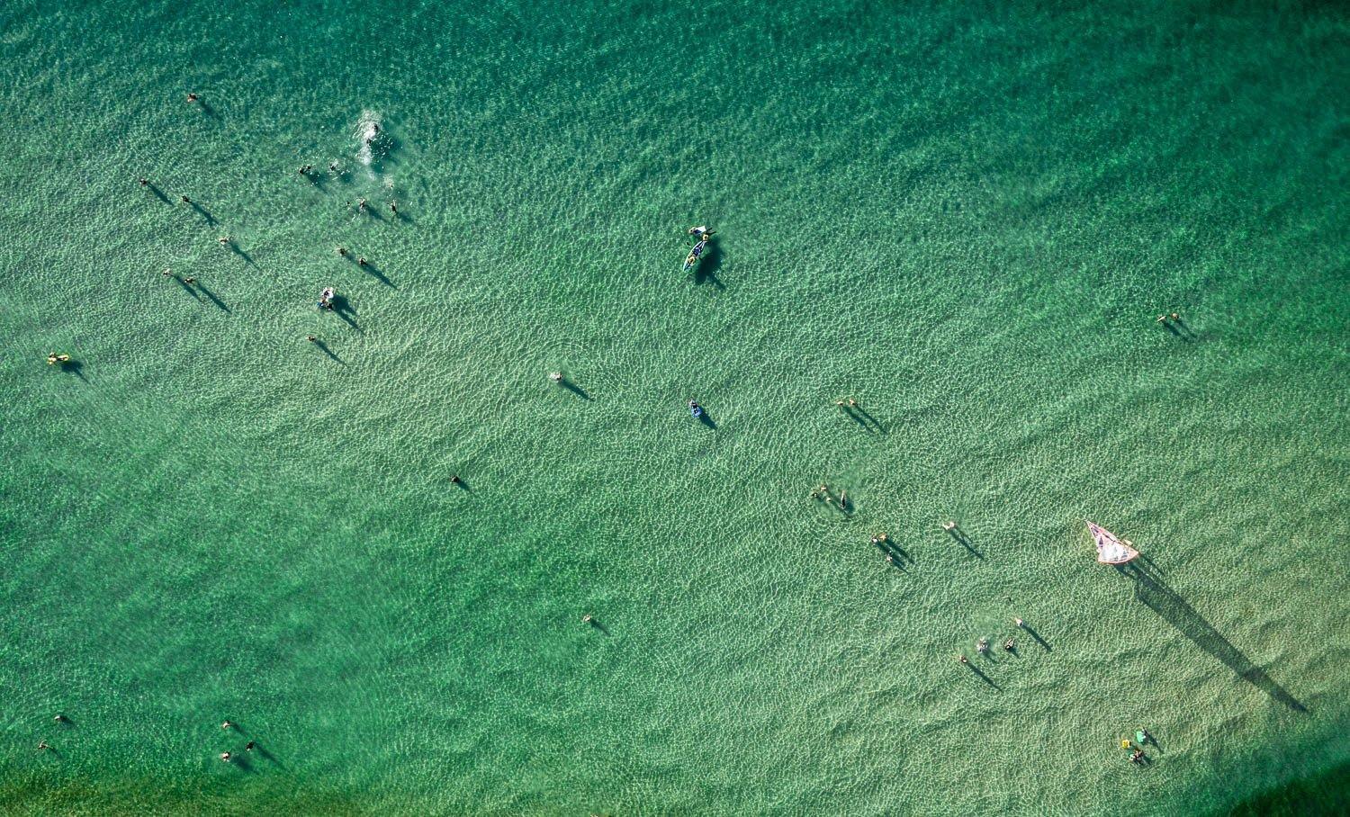 Aerial view of a calm sea with some boats and people over, Summer Shadows, Mt Martha - Mornington Peninsula VIC 