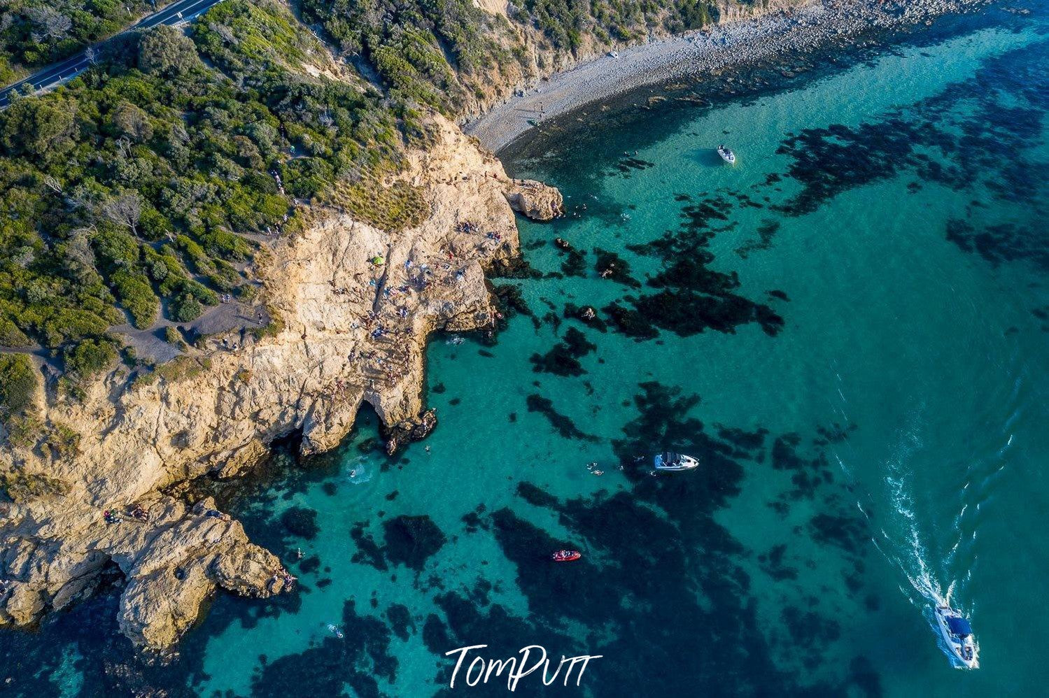 Aerial view of a deep green sea surrounded by giant mountains and greenery, Summer at The Pillars, Mt Martha - Mornington Peninsula VIC 