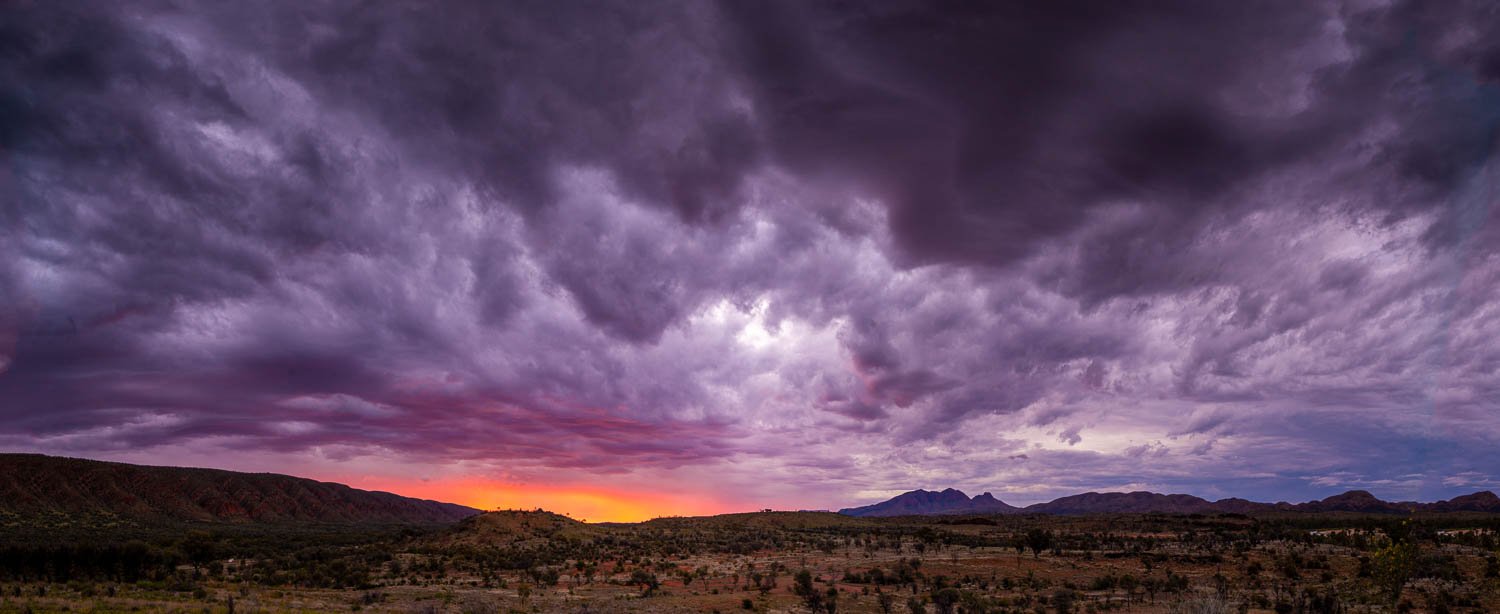 Massive dark clouds over the, Sunset over Mount Sonder, West MacDonnell Ranges - Northern Territory