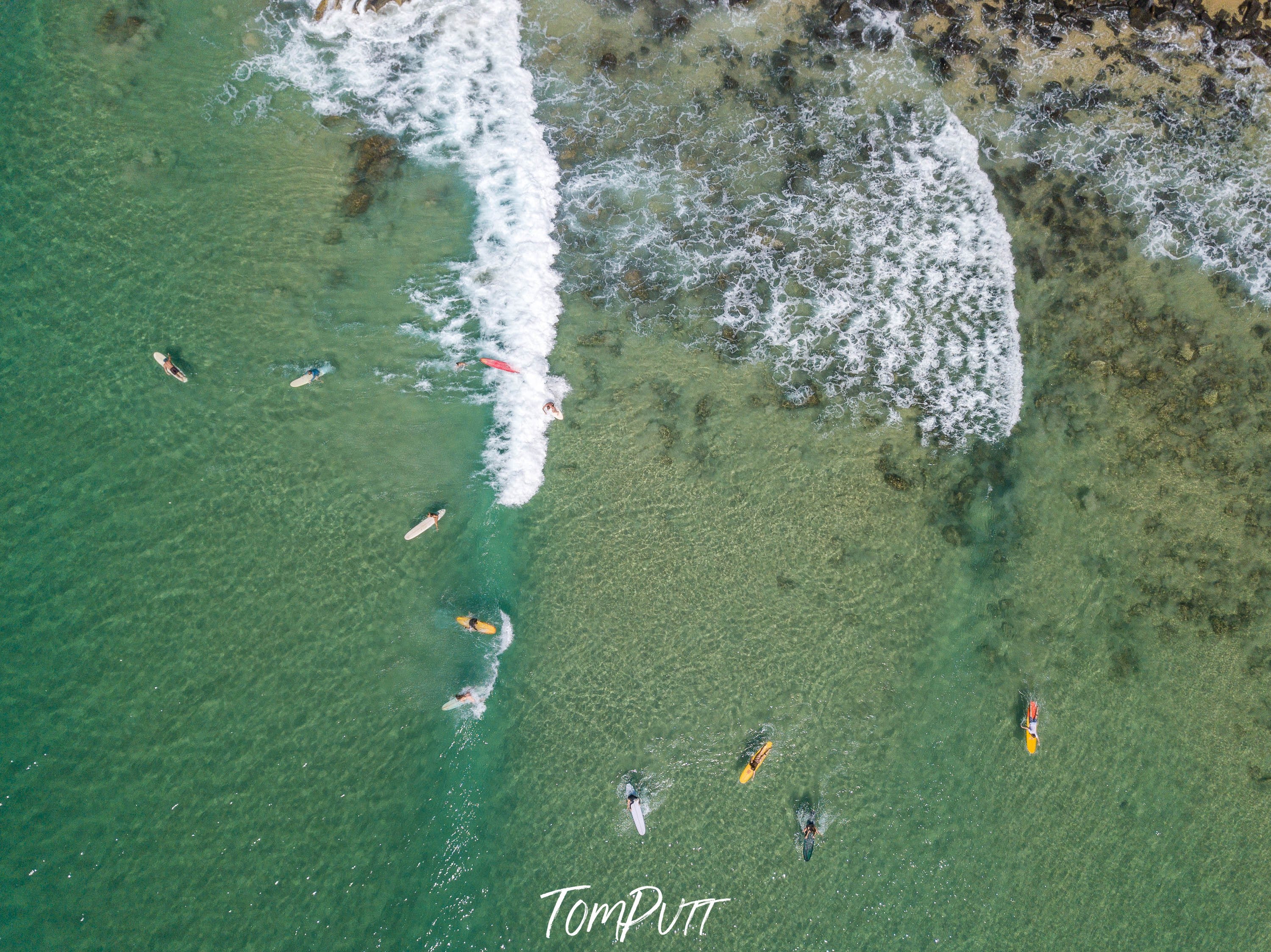 Aerial view of a lake with huge bubbling waves, Surfers catching a break, Noosa National Park, Queensland