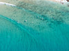 Aerial view of an ice-blue lake, Surfers from above #2, Noosa National Park, Queensland