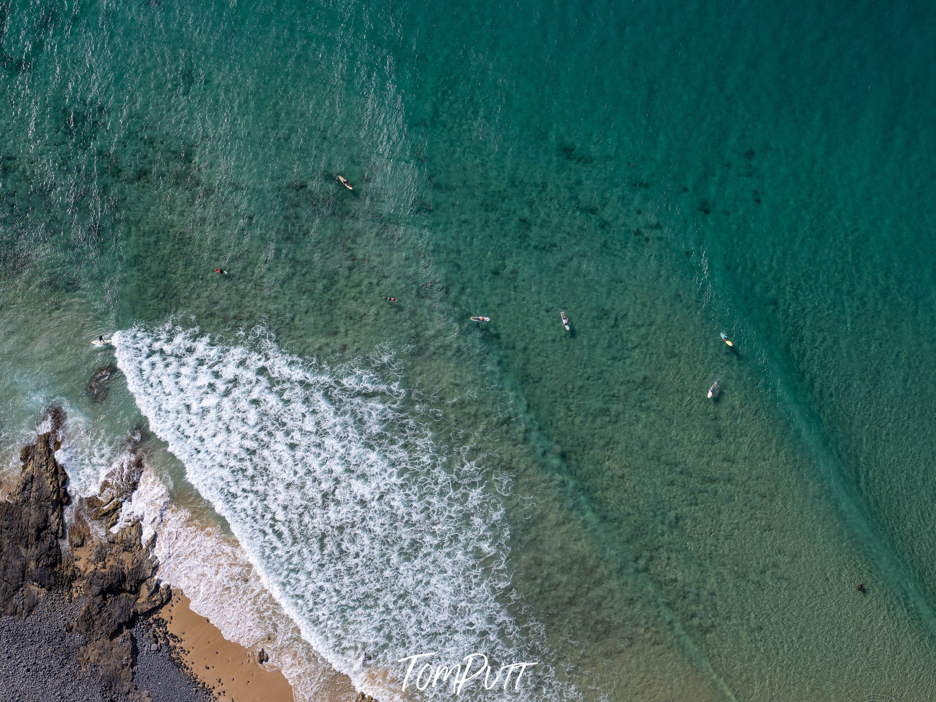 Aerial view of a seashore with giant bubbling waves on the corner, Surfers from above #4, Noosa National Park, Queensland