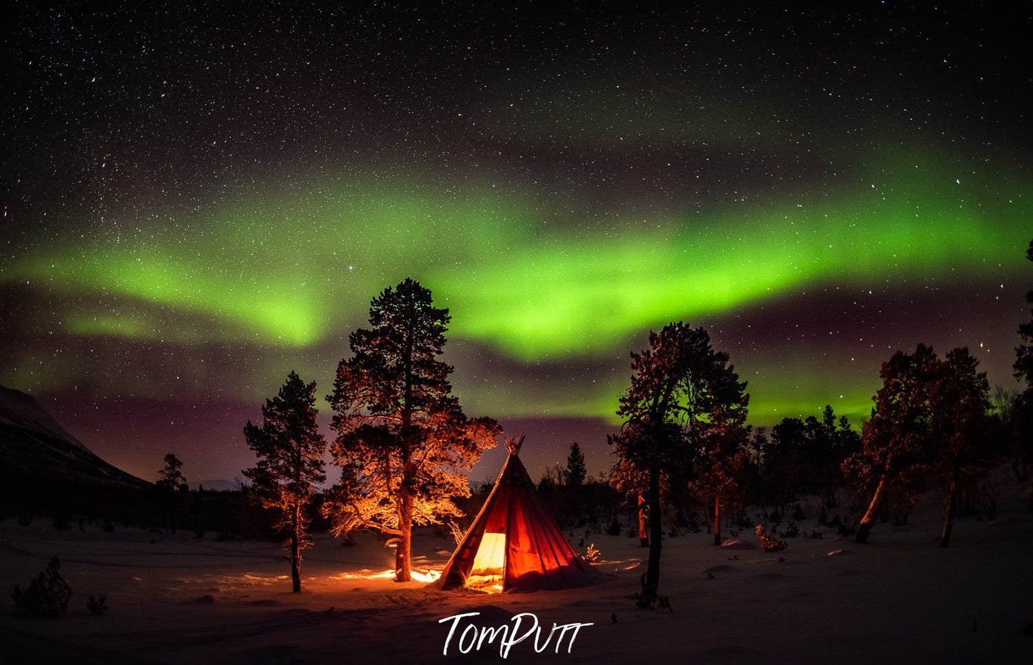 A dark forest with a light-up camp, some natural but weird green lines behind the scene, Sweden No.22