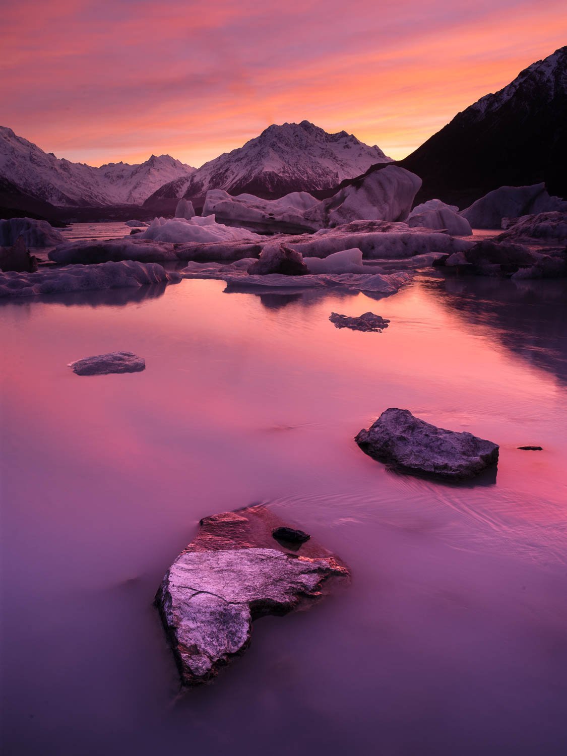 Pink lake with some big stones around, New Zealand #18 