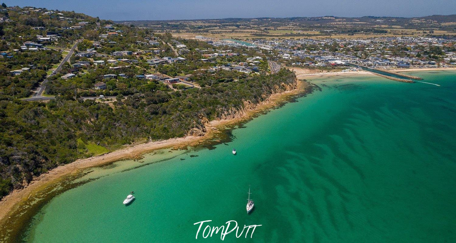 Aerial view of a green sea with a green mountain hill area, Tassells Cove, Mt Martha - Mornington Peninsula VIC