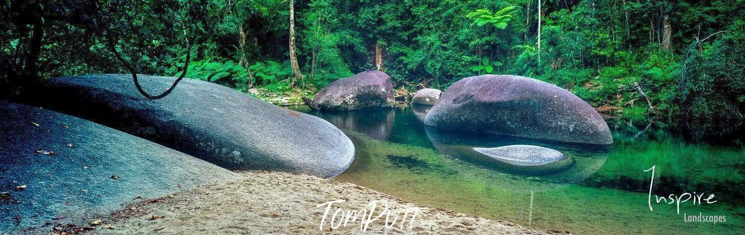 A fresh green area with some boulder and a clear watercourse, The Boulders, Babinda, Far North Queensland