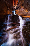 Nested waterfalls from a chocolaty mountain wall, The Chute - Karijini, The Pilbara