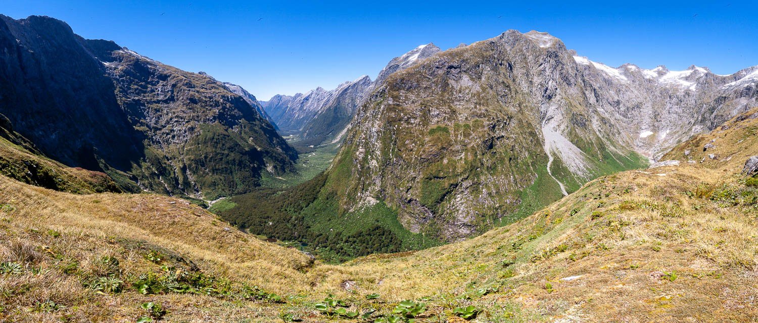 Long stony mountains with some greenery over, The Clinton Valley from MacKinnon Pass, Milford Track - New Zealand
