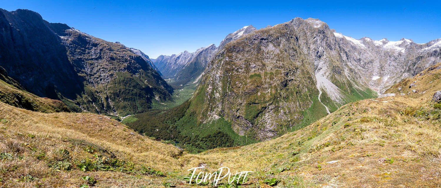 Long stony mountains with some greenery over, The Clinton Valley from MacKinnon Pass, Milford Track - New Zealand