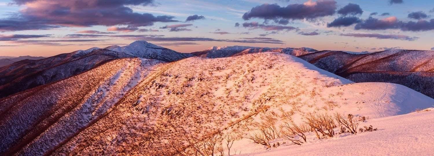 Aerial view of long desert mountain lines, The Razorback and Mt Feathertop Sunset, Victorian High Country 