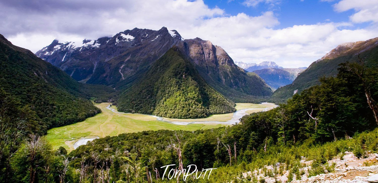 A lush green land with some mountains, The Routeburn Valley, Routeburn Track - New Zealand