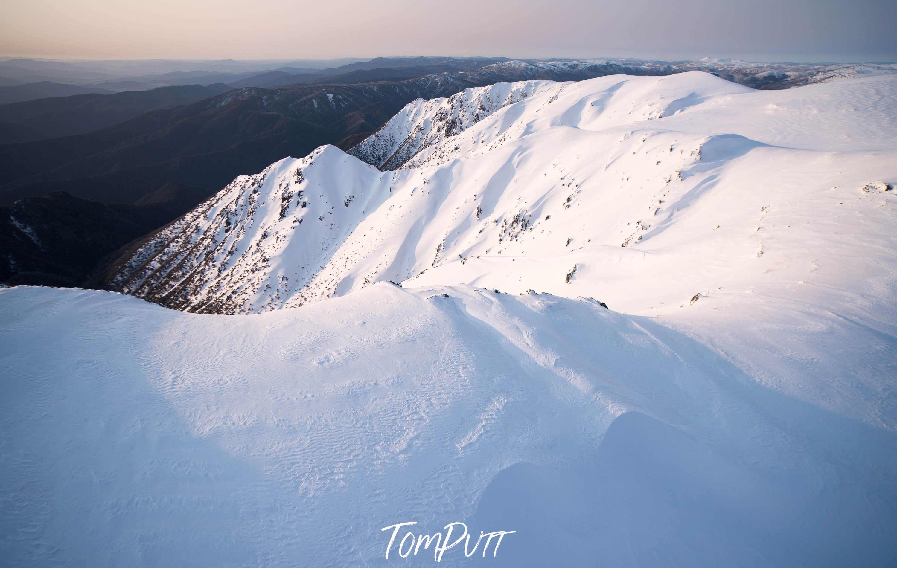 Long mountain sequence fully covered with snow, The Sentinel in winter snow, Snowy Mountains, New South Wales