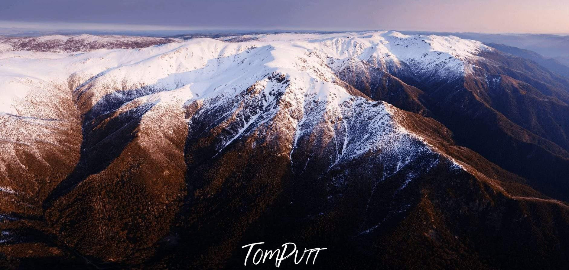 Giant brown mountains with a chocolaty sand over, The Western Face - Snowy Mountains NSW