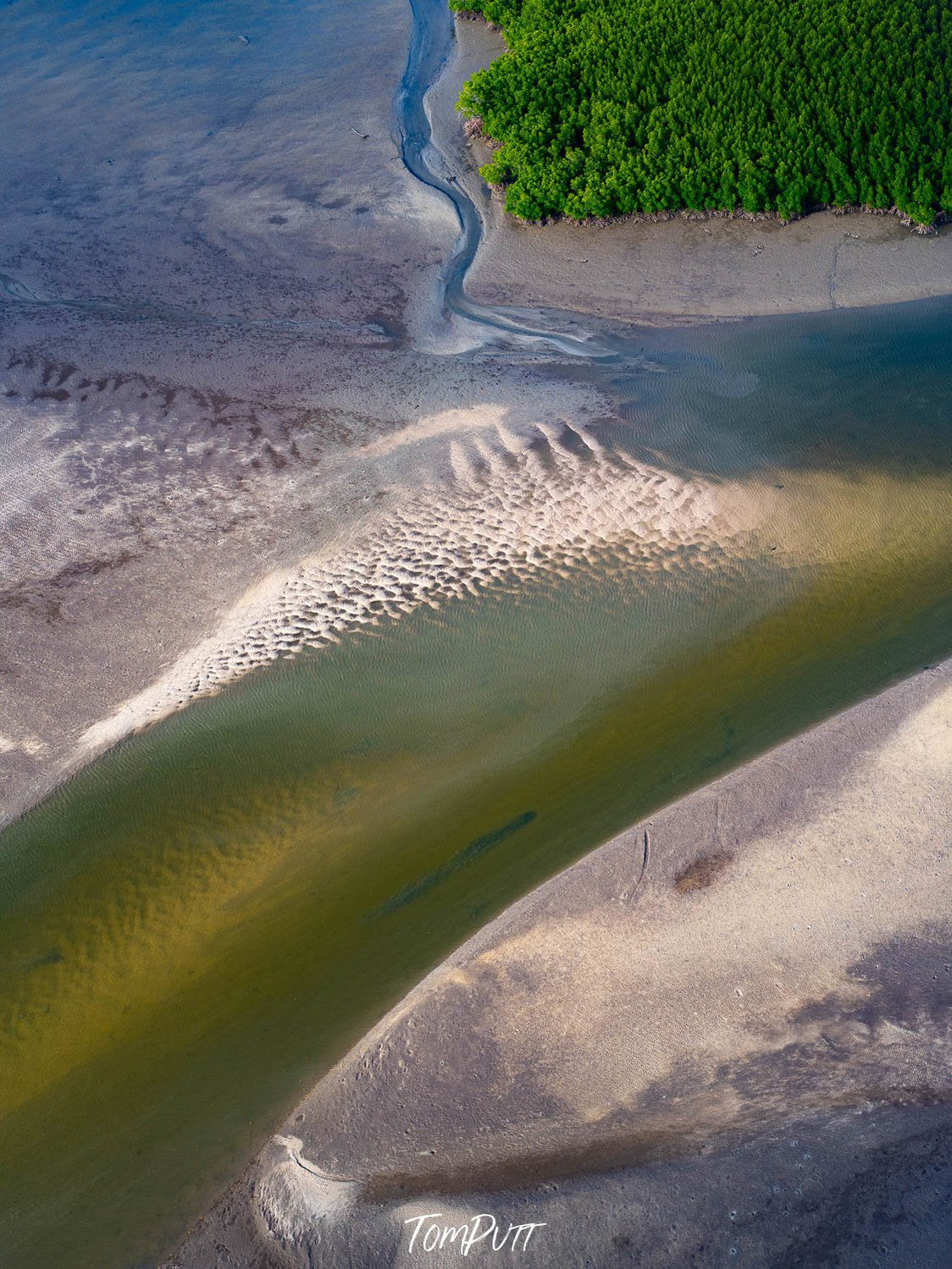 Aerial view of a green water stream with powder-color sand around, Tidal Patterns from above Far North Queensland