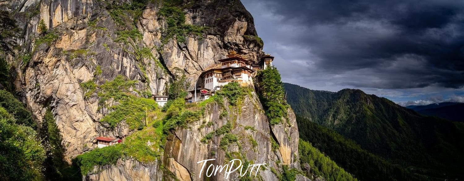 A high mountain with some greenery over and some dangerous pathways across, Tiger's Nest, Bhutan