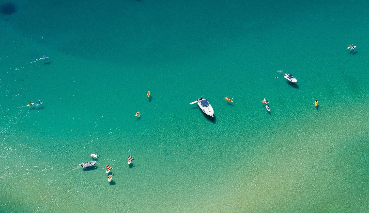 Aerial view of the green ocean with some boats floating over, Turquoise Shadows - Mornington Peninsula VIC Printed