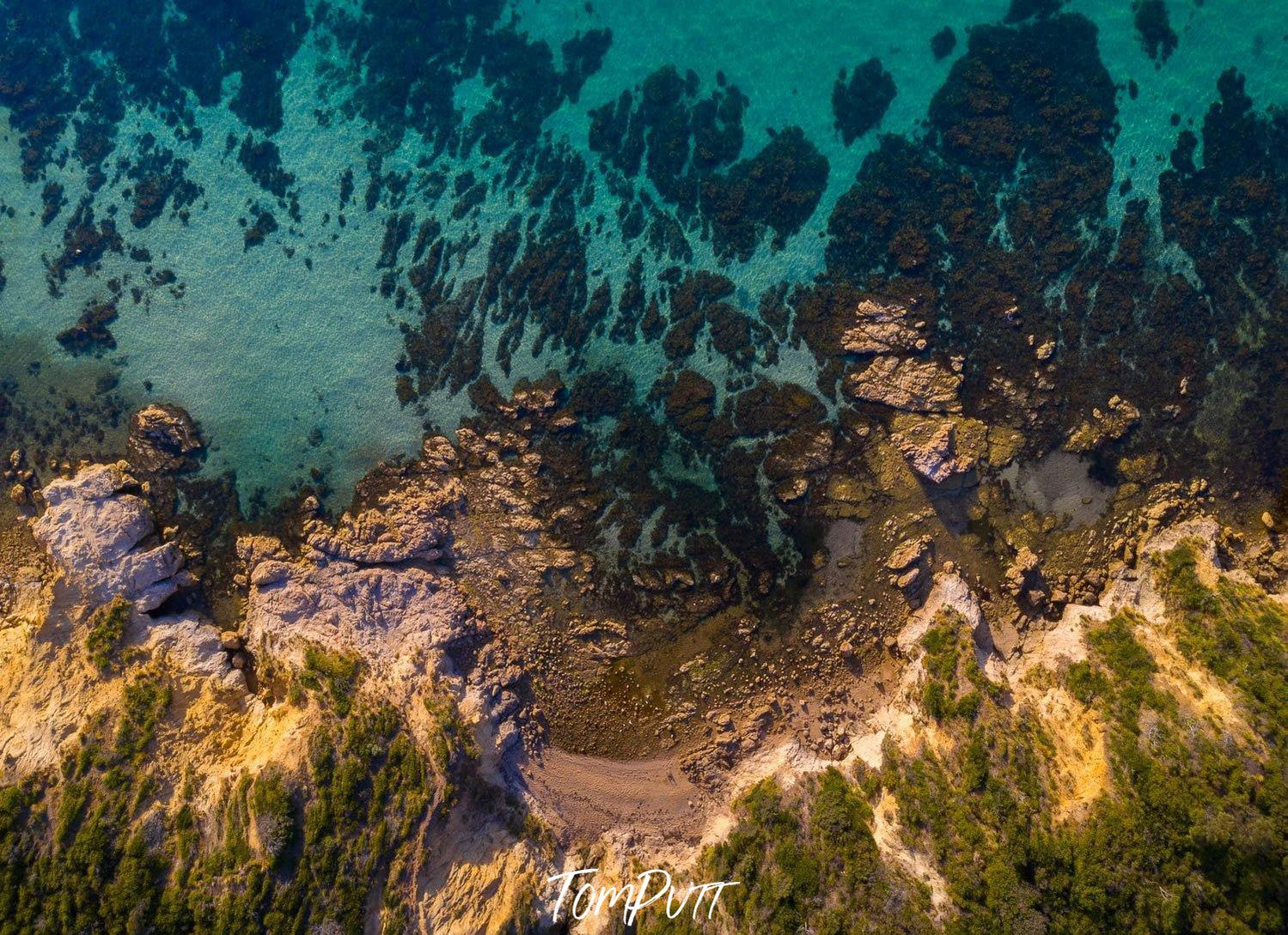 Aerial view of a giant mountain full of greenery, and a sea with greenery underwater below the mountain, Turquoise Waters, Mt Martha - Mornington Peninsula VIC