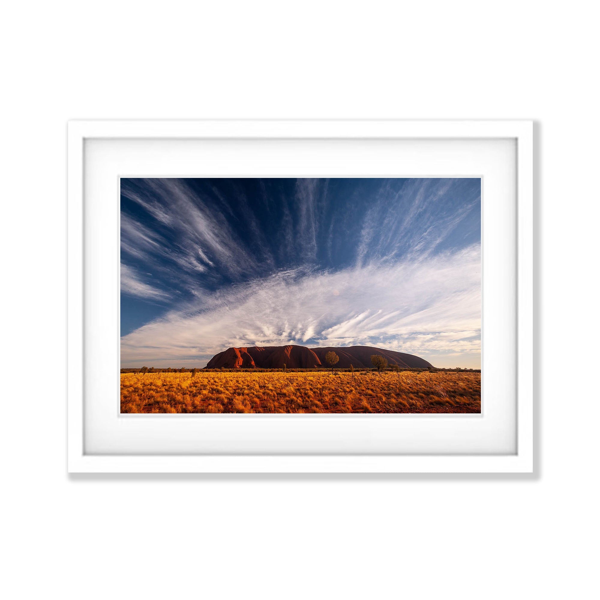 Uluru Sunrise with streaming clouds, Central Australia