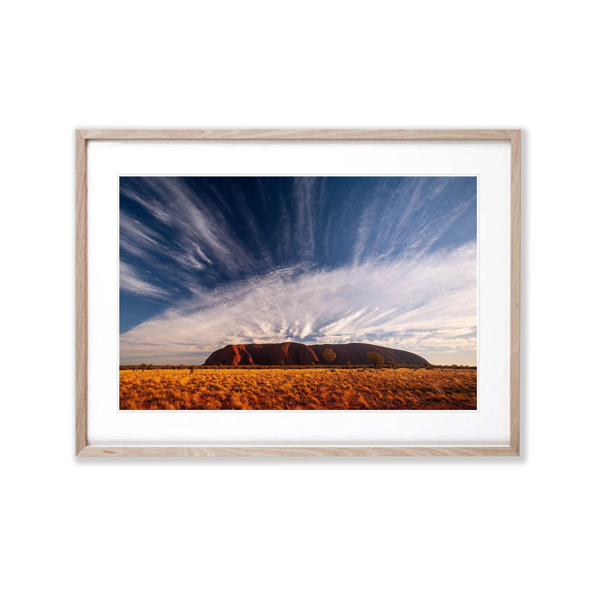 Uluru Sunrise with streaming clouds, Central Australia