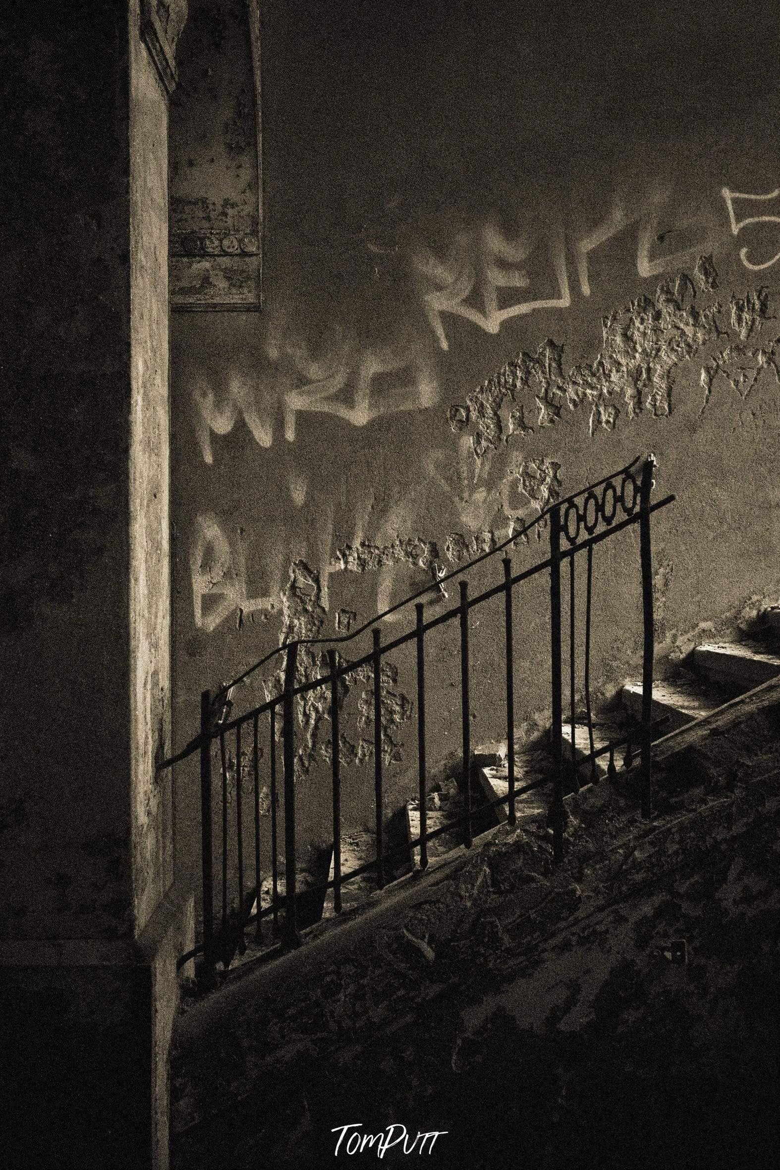 A wall inside a house with something written in an unknown language