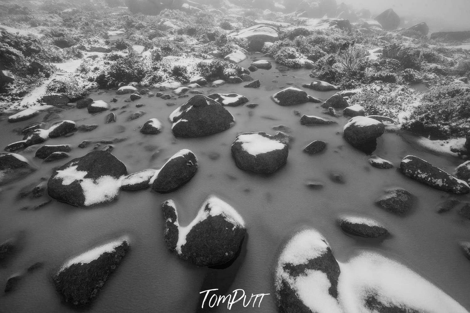 Big black stones on a small watercourse, Depicting chocolate chips, Wellington Winter - Mt Wellington TAS