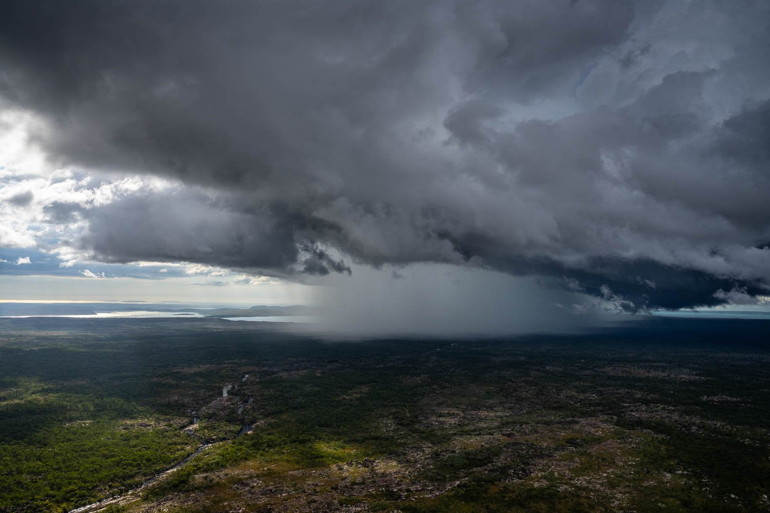 Giant clouds over a sea, creating a sea storm, Wet Season Downpour, The Kimberley